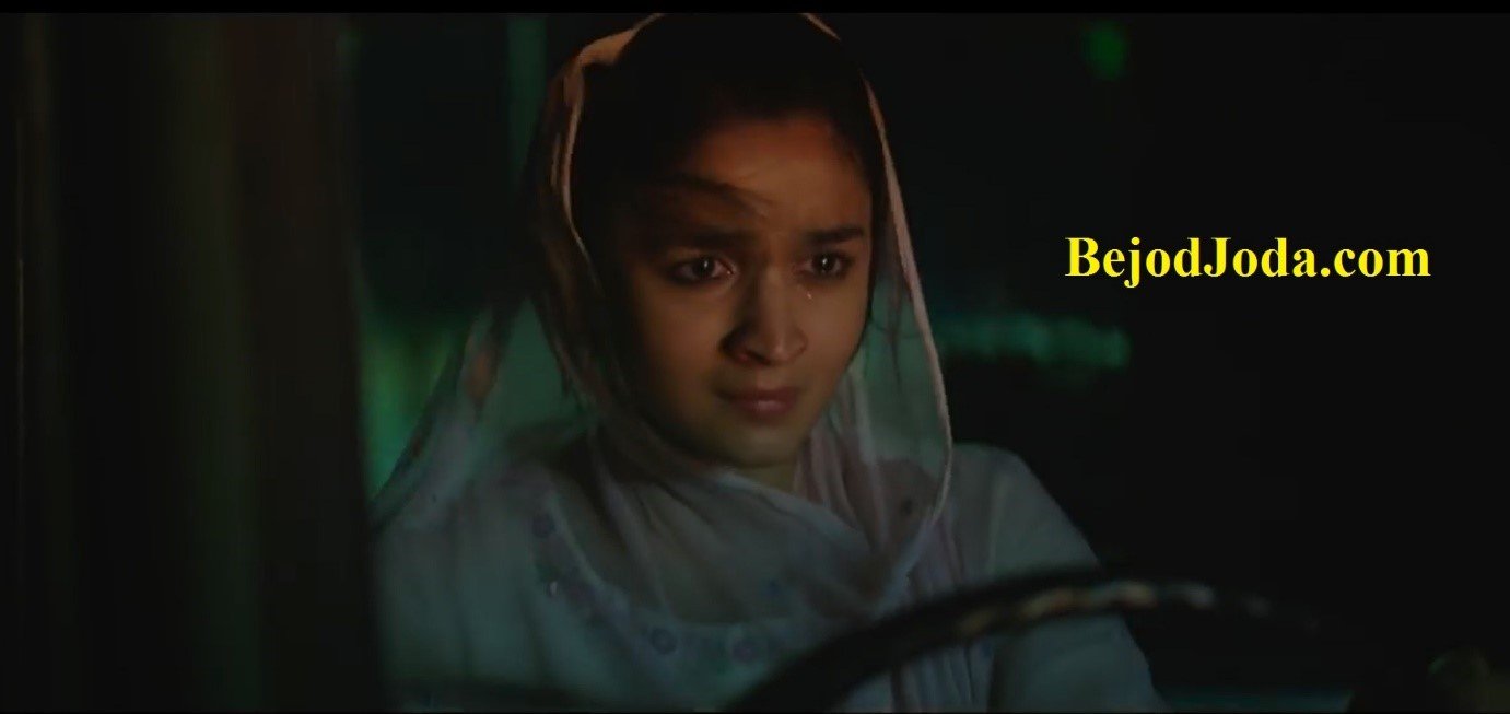 Emotionally shattered Alia Bhatt due to circustances driving a vehicle - a still from film Raazi